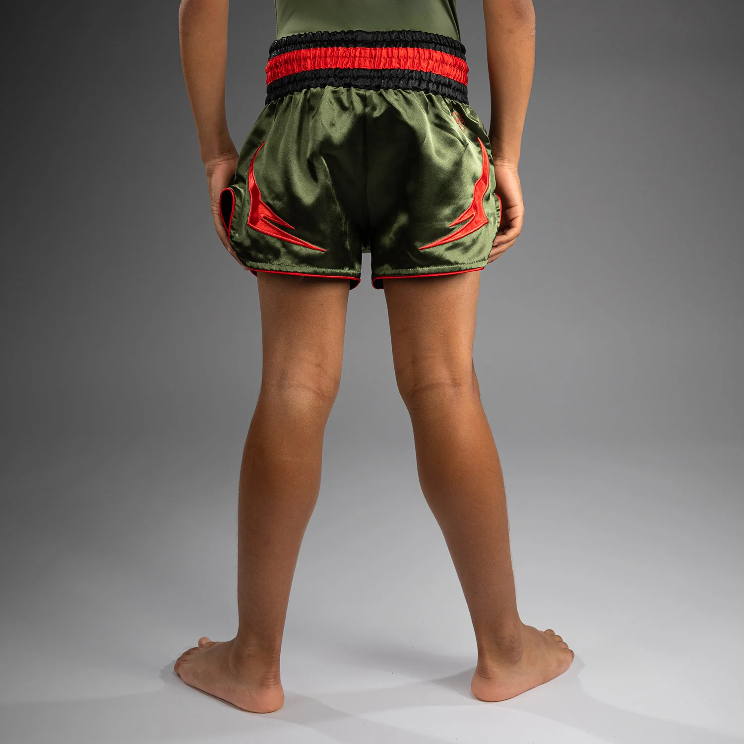 Venum Inferno Kids Muay Thai Shorts - Army Green/Orange - Image 2