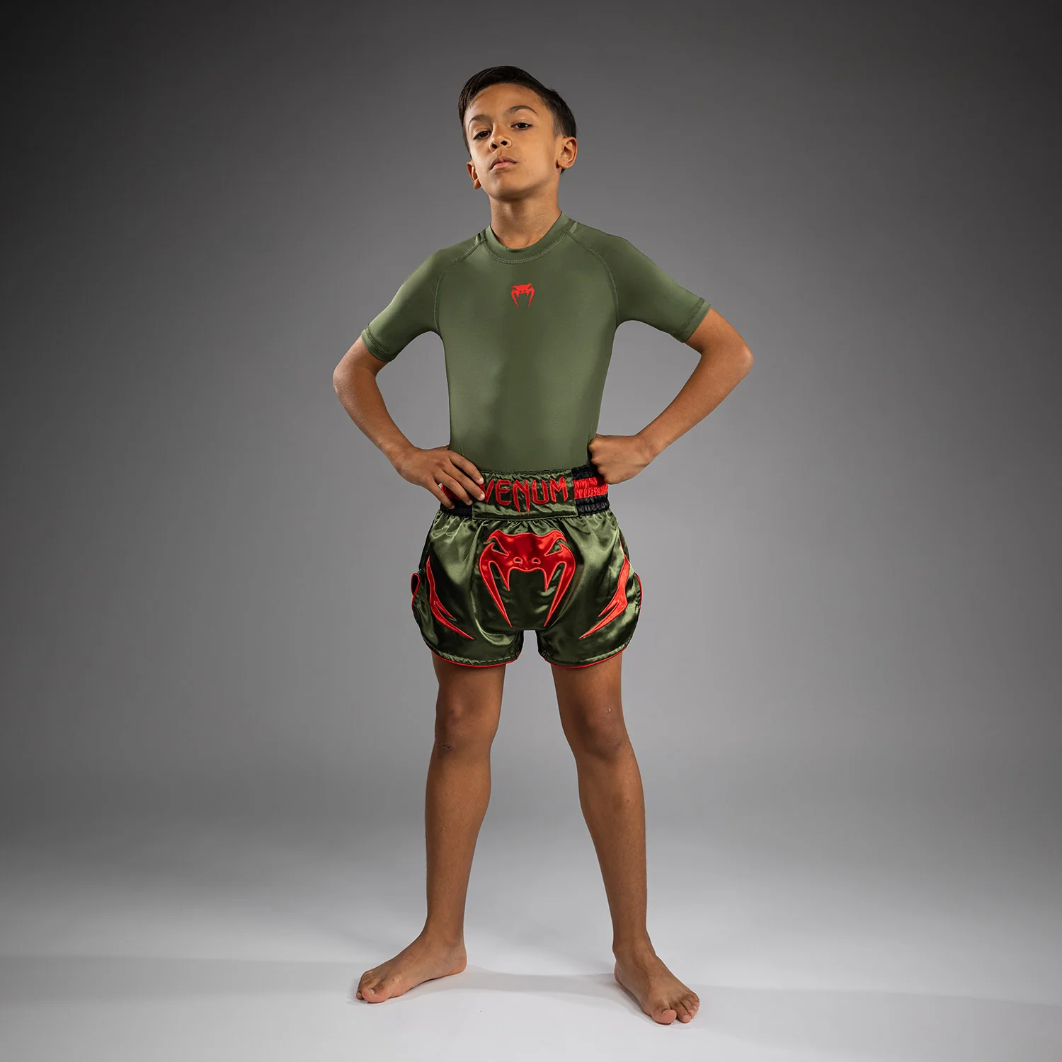 Venum Inferno Kids Muay Thai Shorts - Army Green/Orange - Image 4