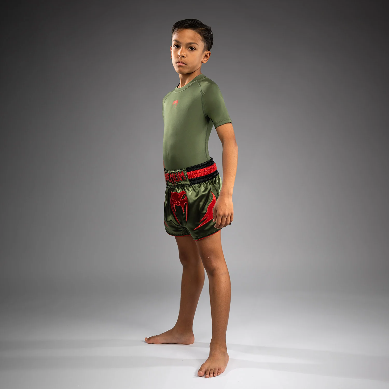 Venum Inferno Kids Muay Thai Shorts - Army Green/Orange - Image 6