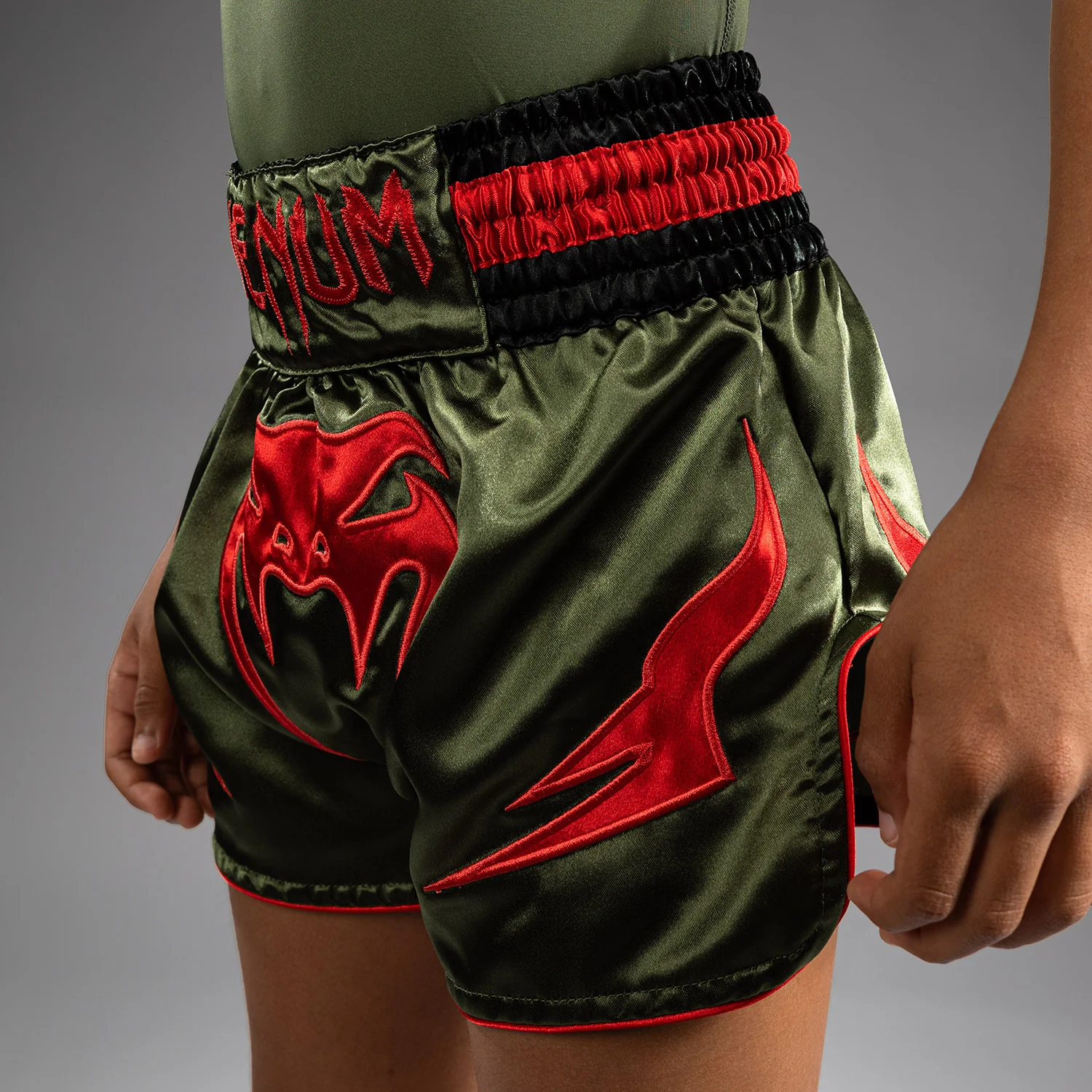 Venum Inferno Kids Muay Thai Shorts - Army Green/Orange - Image 7