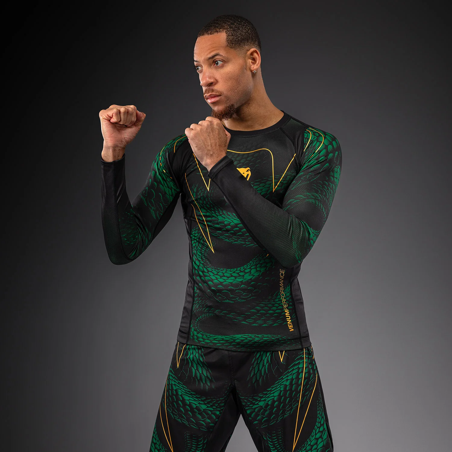 Venum Matupa Long Sleeve Rashguard - Black/Green/Gold - Image 6