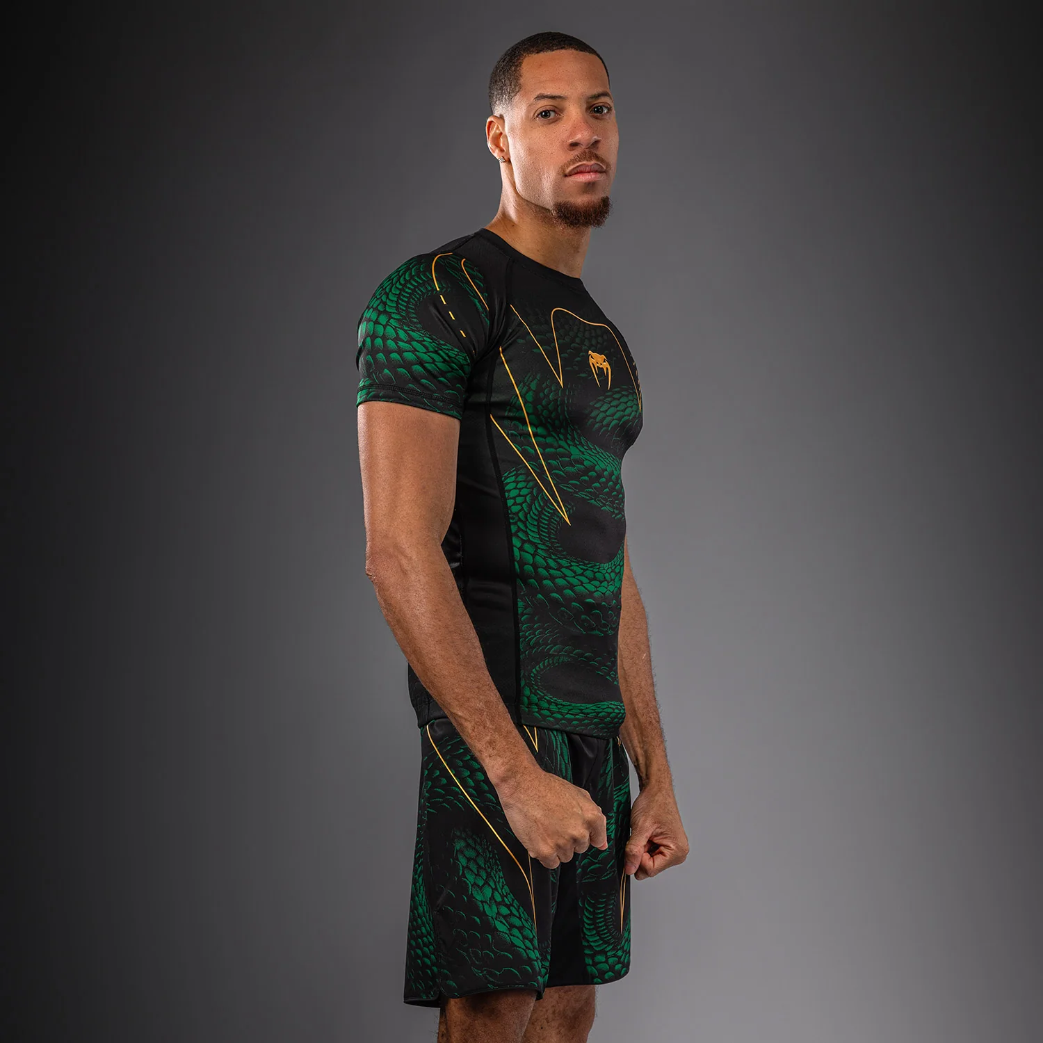Venum Matupa Short Sleeve Rashguard - Black/Green/Gold - Image 3