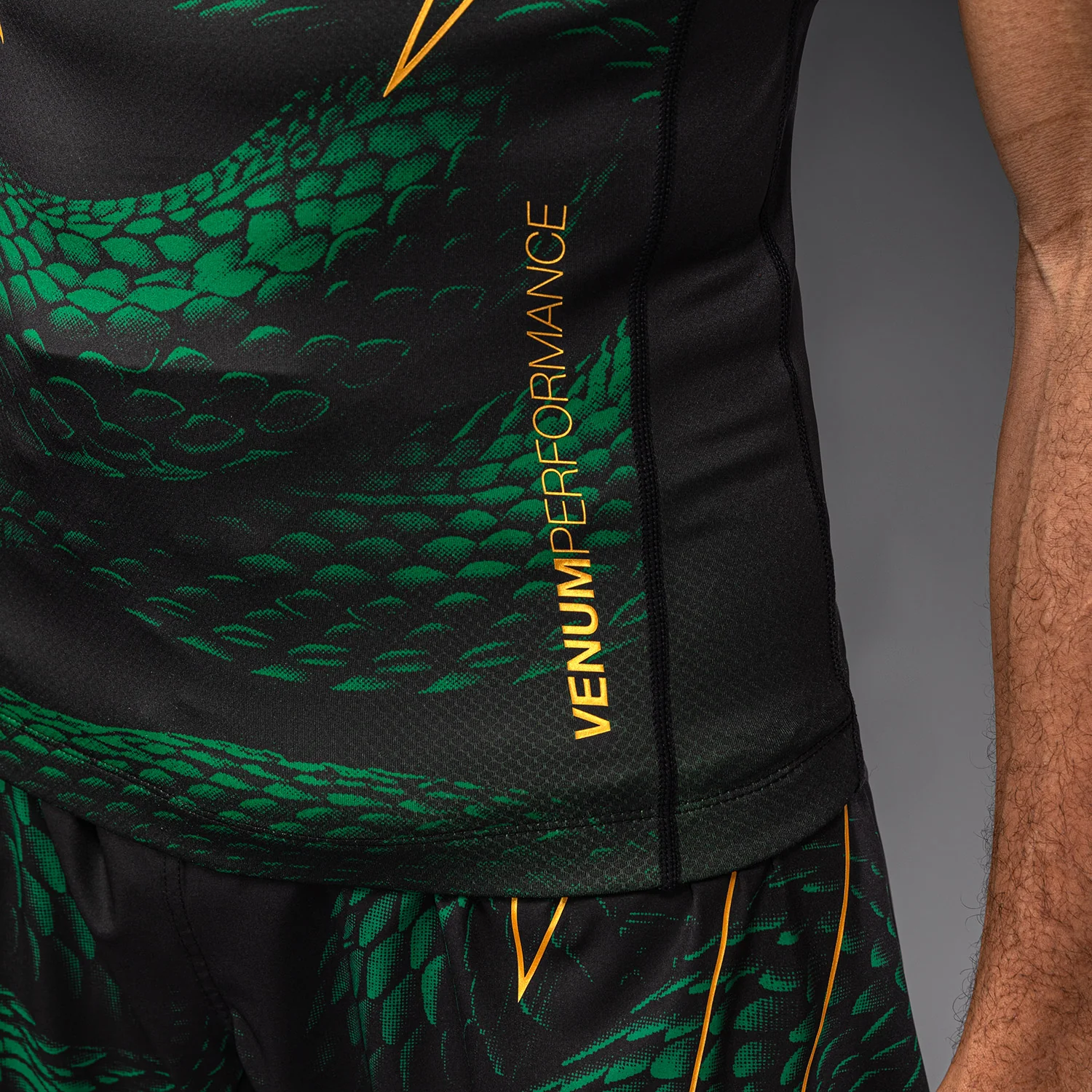Venum Matupa Short Sleeve Rashguard - Black/Green/Gold - Image 6