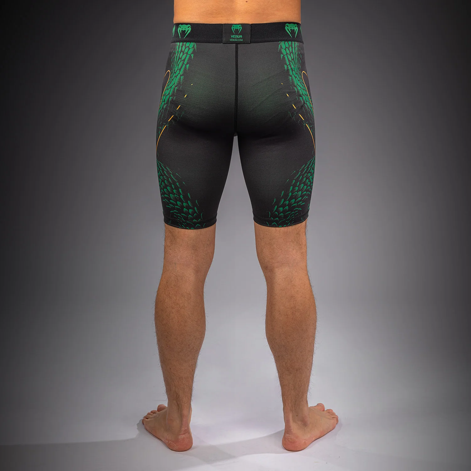 Venum Matupa Vale Tudo Shorts - Black/Green/Gold - Image 4
