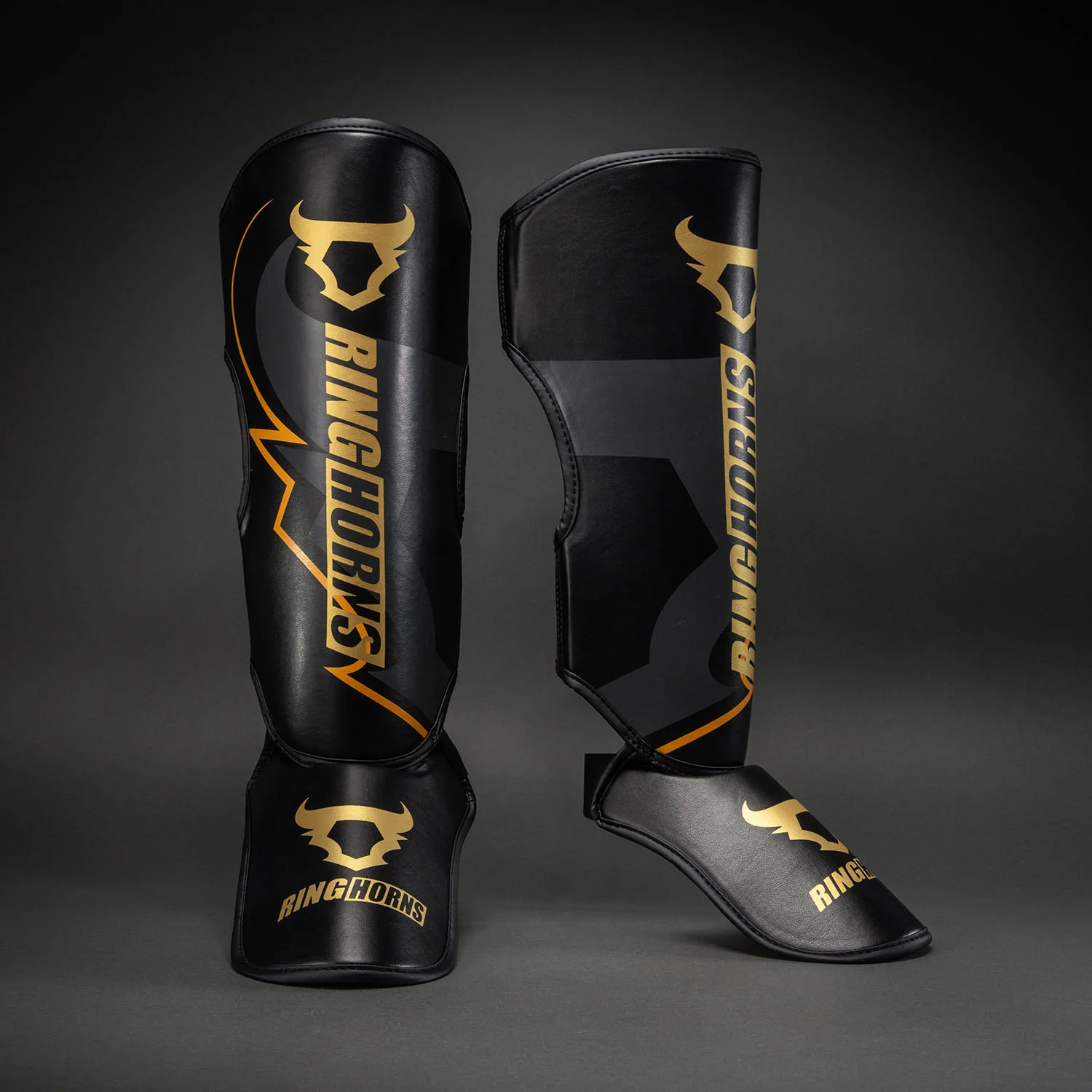 Ringhorns Charger by Venum Shin Guards - Black/Gold