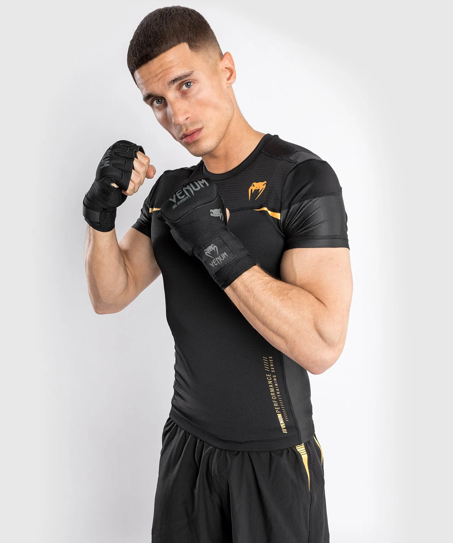 Venum tempest 2.0 Rashguard Short Sleeves – Black/Gold - Image 4