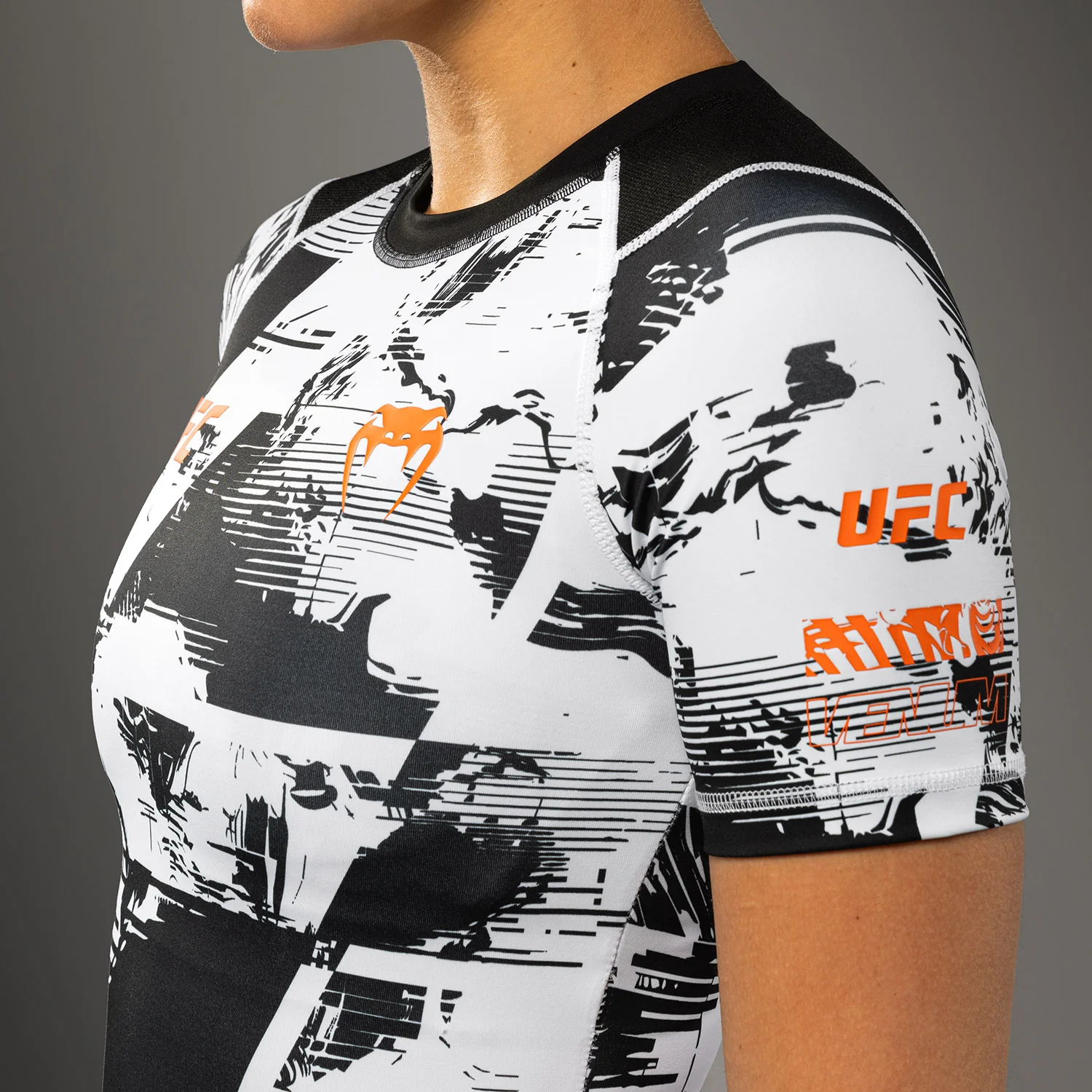 Women’s UFC Zenith by Venum White Authentic Fight Week Performance Short Sleeve Rashguard - Image 6